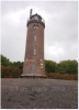 Der Bhler Leuchtturm im Bereich Sderhft ist ein runder, rotbrauner Ziegelturm auf dem Seedeich mit einer Gesamthhe von 18,4 m. Er wurde 1892 als Tagessichtzeichen erbaut. 1914 erhielt er seine Laterne.